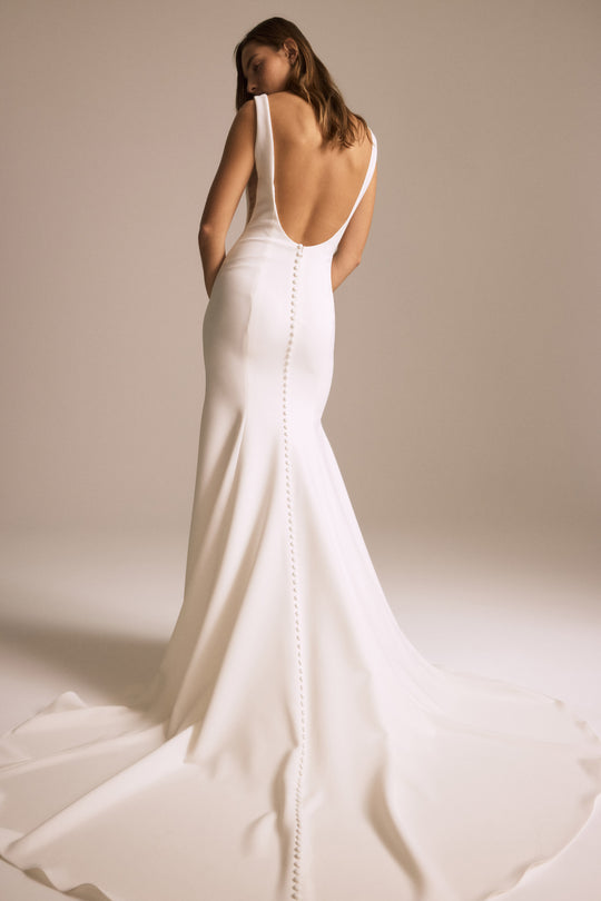 Nada, $2,595, dress from Collection Bridal by Nouvelle Amsale, Fabric: crepe