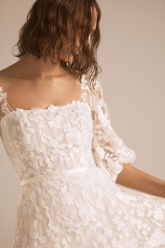 Sedona, $4,250, dress from Collection Bridal by Nouvelle Amsale, Fabric: floral